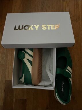 Women’s  Green Sneakers with White Stripes